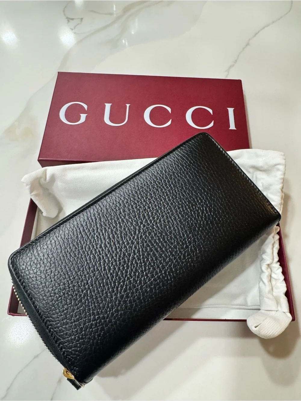 Gucci Black Pebbled Leather Zip Wallet with Gold Logo